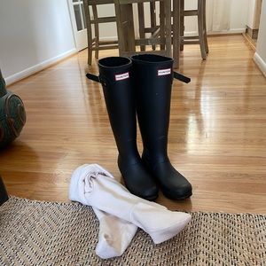 Black knee high rain boots